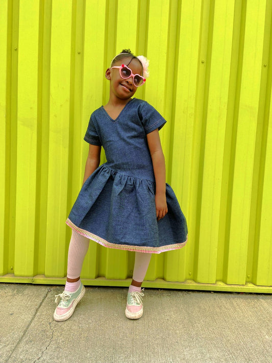 Denim dress with pink frills design