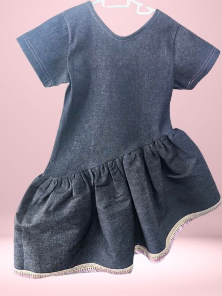 Denim dress with pink frills design
